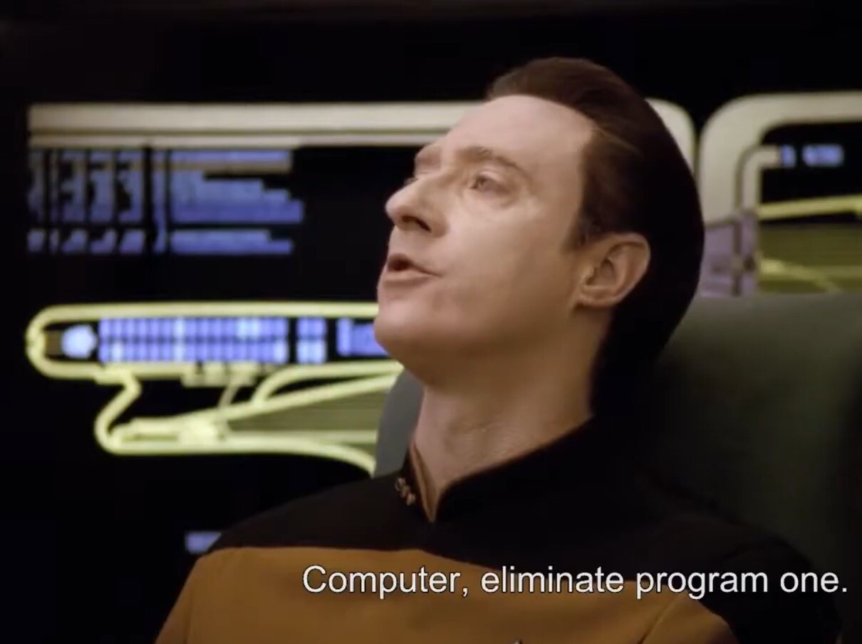 Star Trek TNG character speaking to the ship's computer