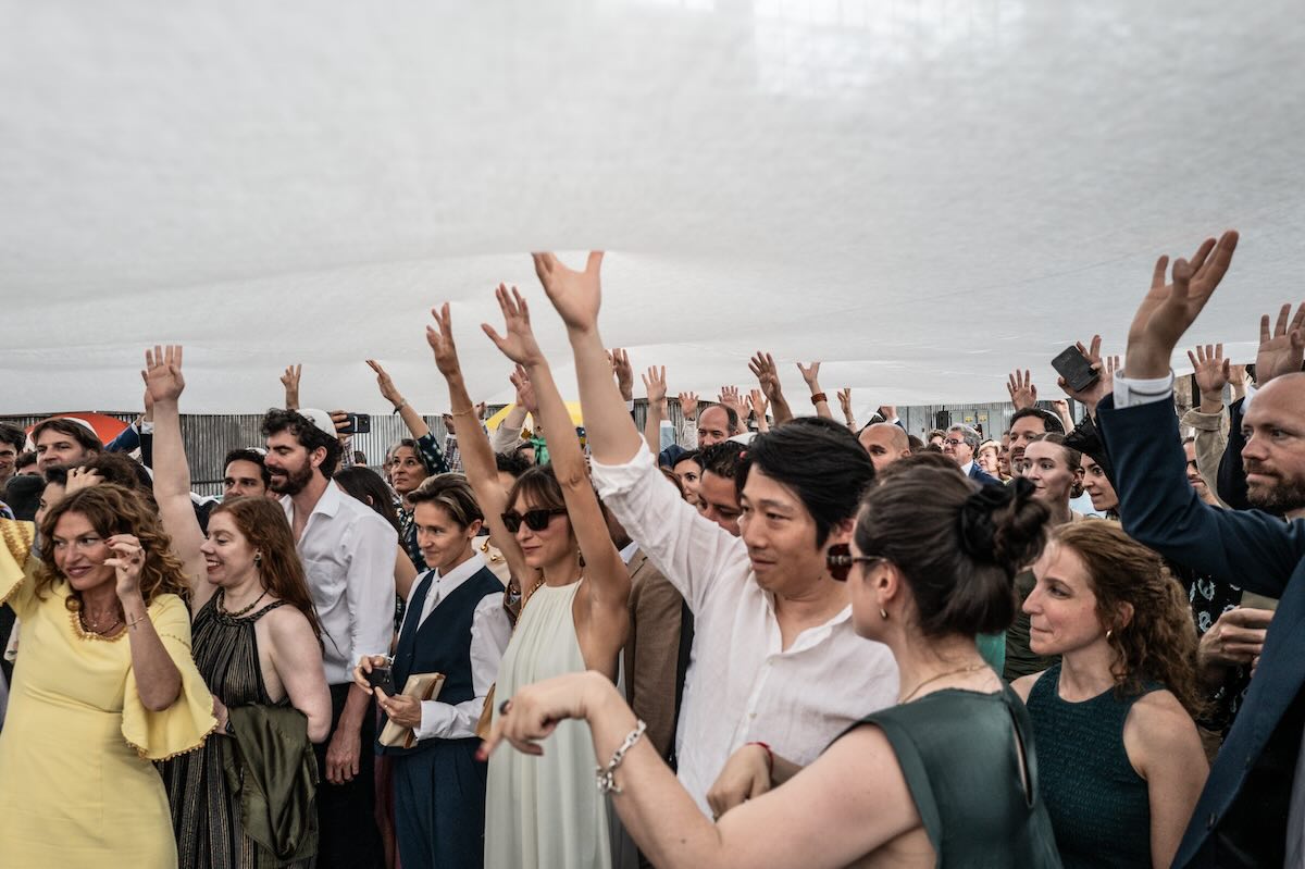Group with arms raised
